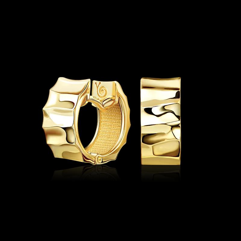 Широкие золотые серьги